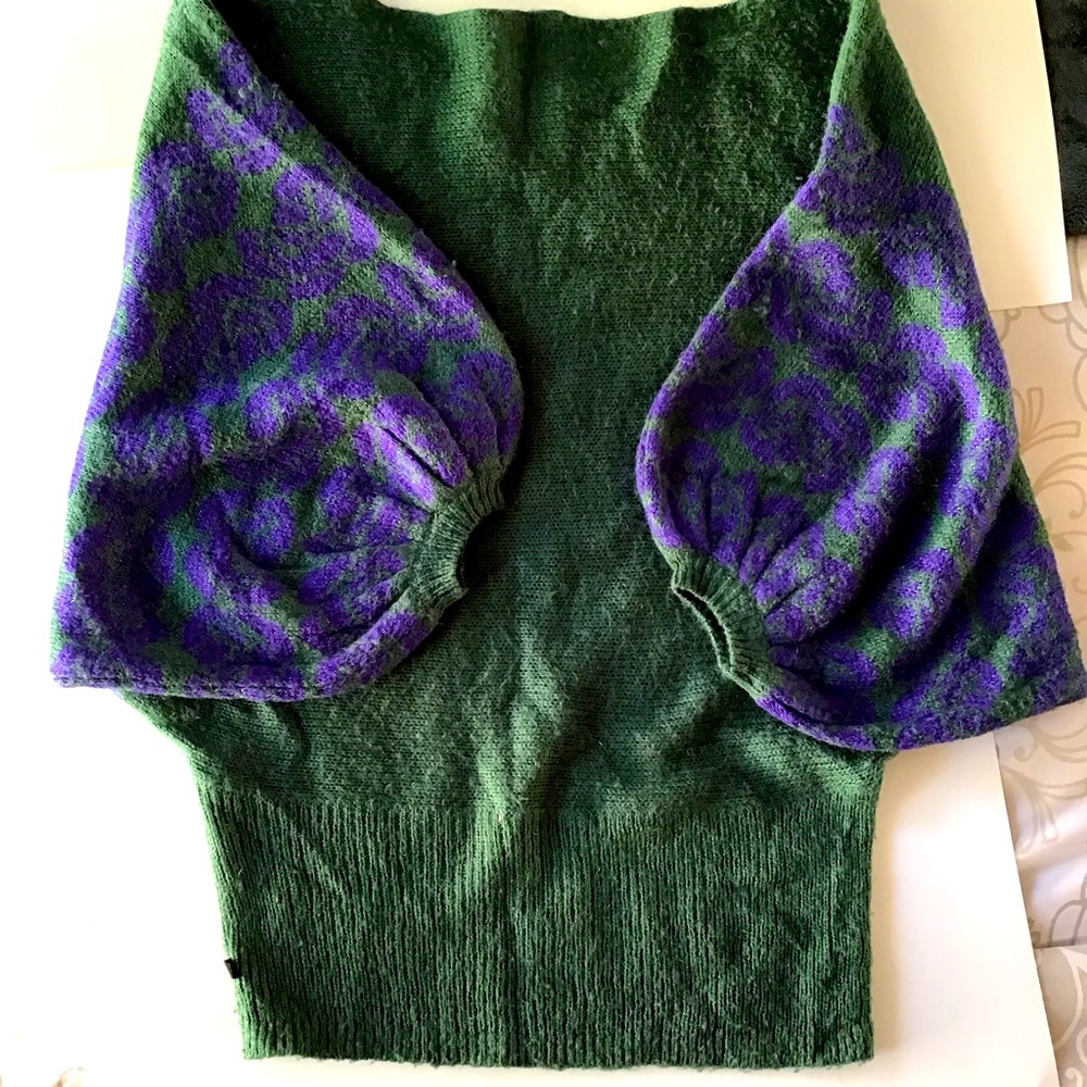 Women’s sweater, dark green and large, puffy embroidered purple sleeves.